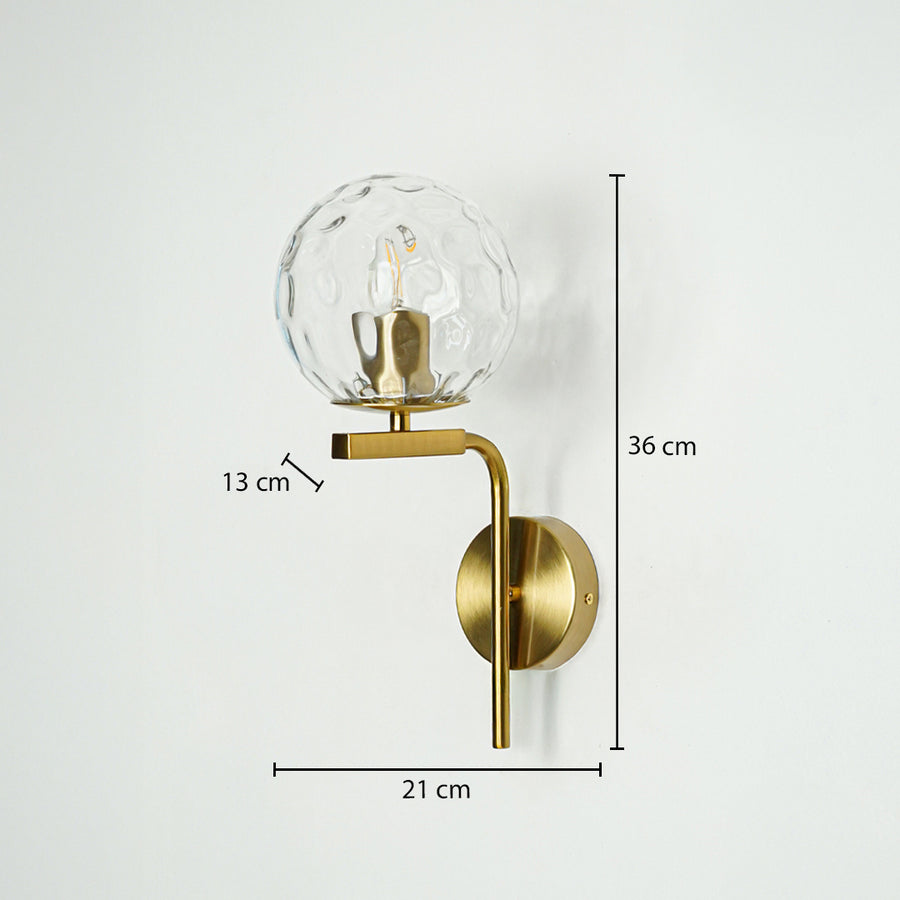 Gold metal textured glass wall light with 36 cm height 21 cm width and 13 cm depth for modern decor spaces.