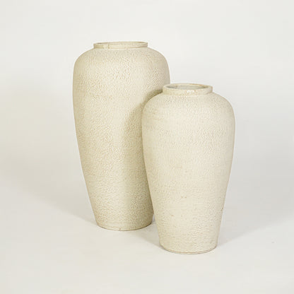 White background image of beige ceramic vase set for modern floor decor styling with artistic matte finish.