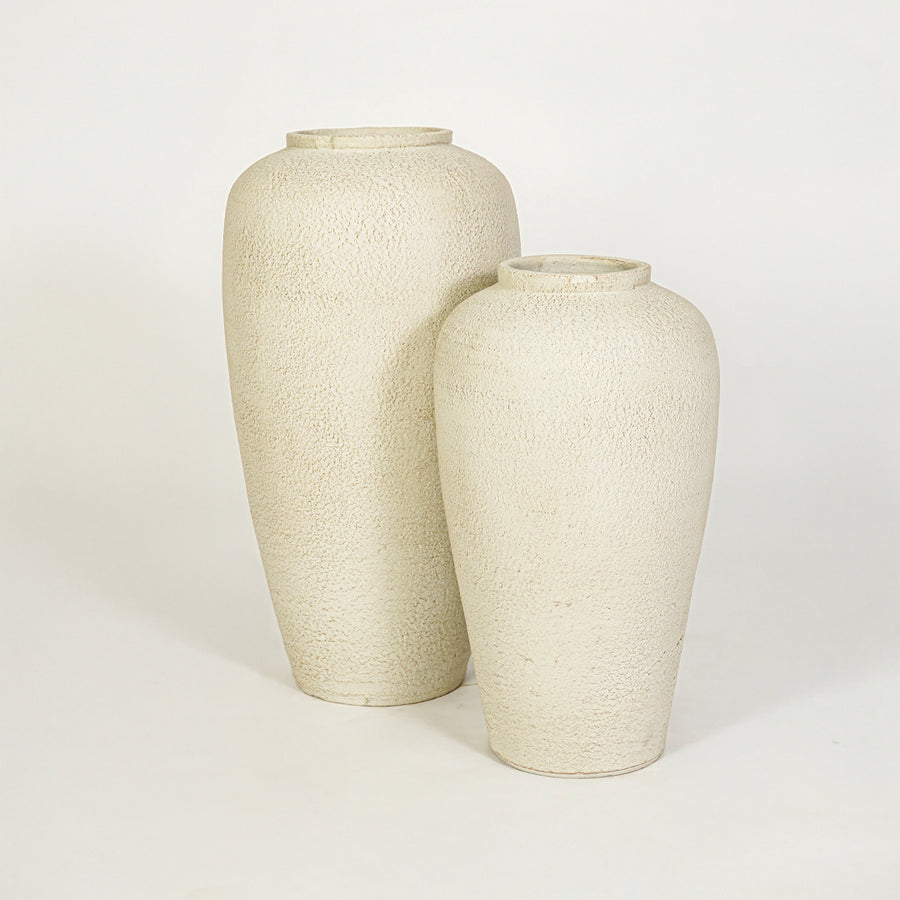 White background image of beige ceramic vase set for modern floor decor styling with artistic matte finish.
