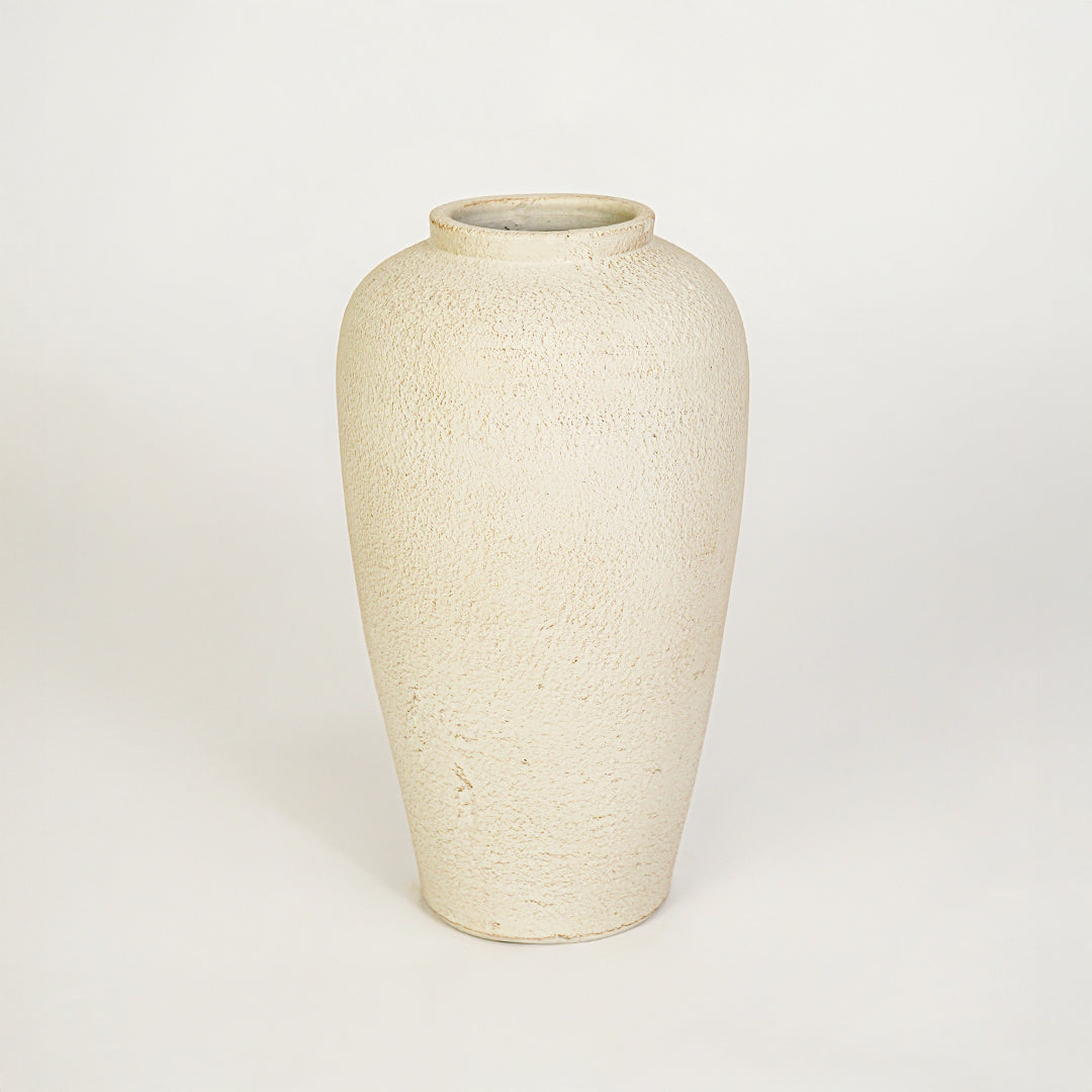 White background image of beige ceramic floor vase for elegant interior decor styling with textured matte finish.