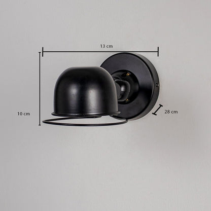 Wall light with matte black dome shade and cage detail shown with size 10 cm height 13 cm width and 28 cm depth.