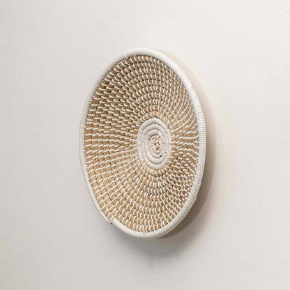 Natural woven seagrass wall basket for living room hallway and boho wall décor on white background image.