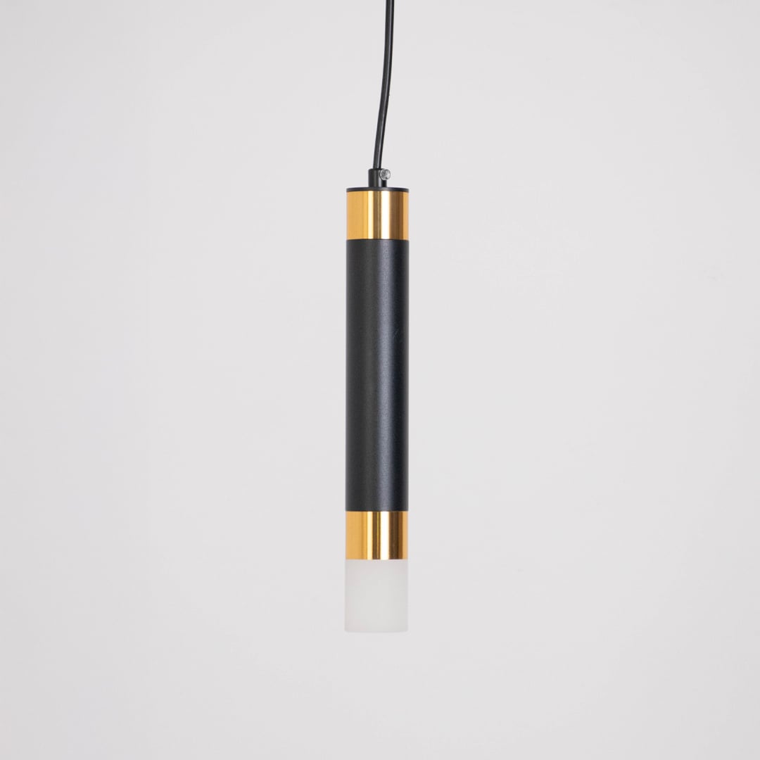 Minimalist black and gold cylindrical pendant light turned off displayed on white background for product showcase.
