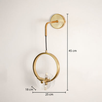 Modern gold ring wall light measuring 43 cm height 23 cm width and 18 cm depth on white background.