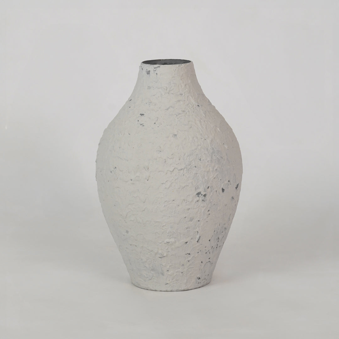 Simple textured speckled white ceramic vase for chic modern home decor and stylish minimalist tabletop displays.