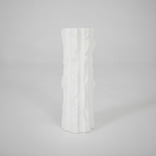 White textured ceramic vase for modern shelf placement and elegant indoor home decor styling accent piece.