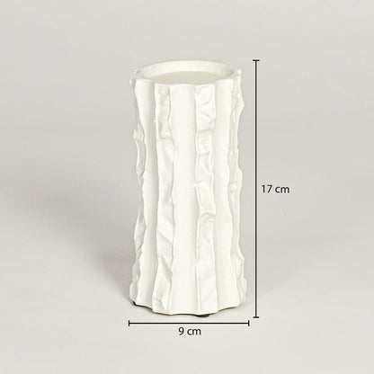 White textured ceramic vase dimension image with 17 cm height and 9 cm width for modern shelf decor.