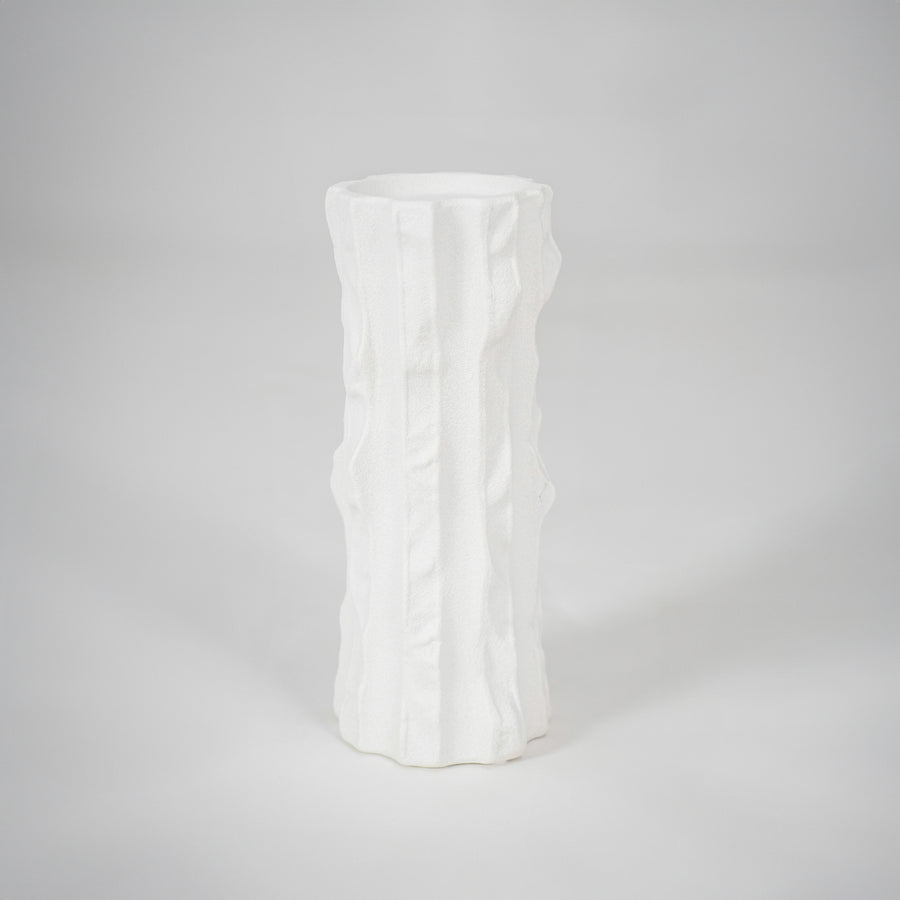 White sculptural ceramic vase for stylish console table placement and contemporary living room decor styling.