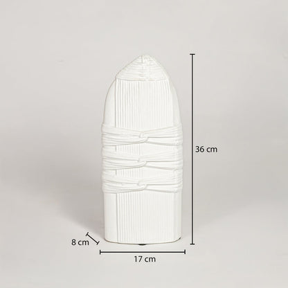 White ceramic sculpted decorative vase measuring 36 cm height 17 cm width and 8 cm depth ideal for modern decor placement.