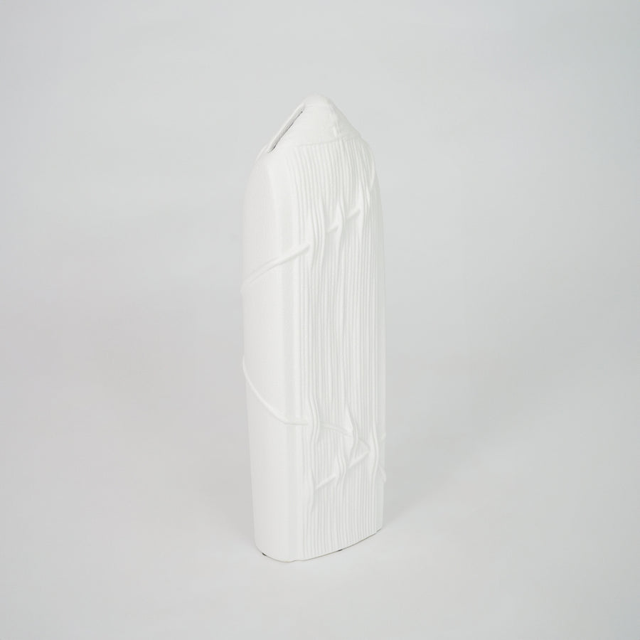 White geometric ceramic decor object for elegant coffee table placement and minimalist indoor decor styling accent.
