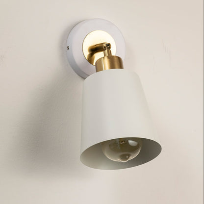 Modern white metal spotlight wall light with brass accents for elegant interior lighting decor.