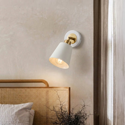 Contemporary white spotlight wall light creating cozy bedroom ambiance with warm interior lighting.