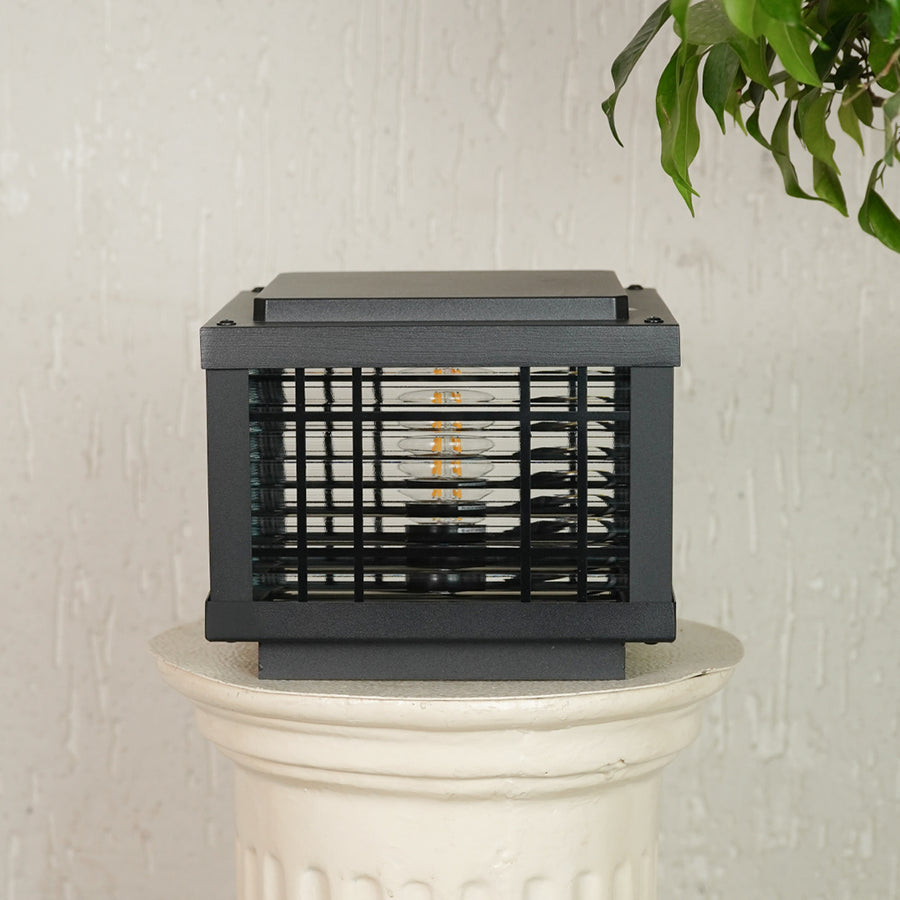 Black metal outdoor gate light with mesh frame for stylish exterior decor styling use.