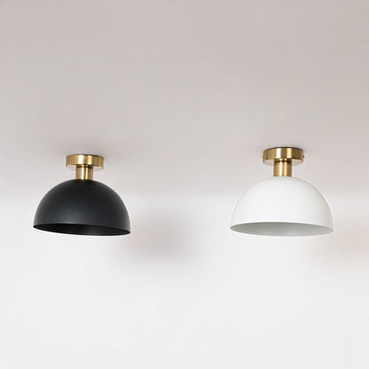 Black and white ceiling lights with gold fittings and dome shades in off mode on white background for stylish home decor.