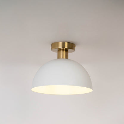 Modern white metal dome ceiling light with soft ambient lighting for elegant hallway and contemporary decor spaces.