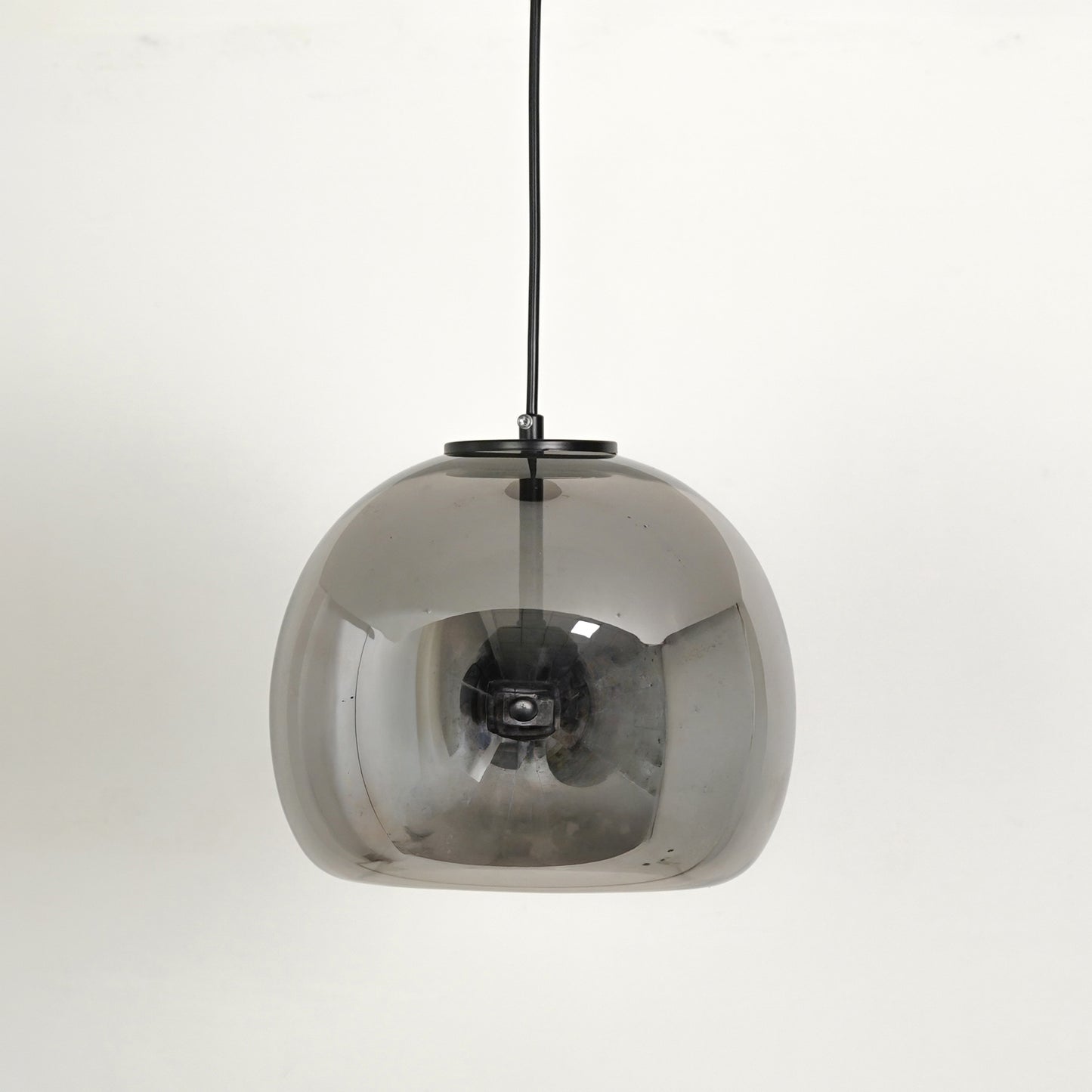 White background image of modern black metal pendant light for modern dining room decor styling with smooth matte finish.