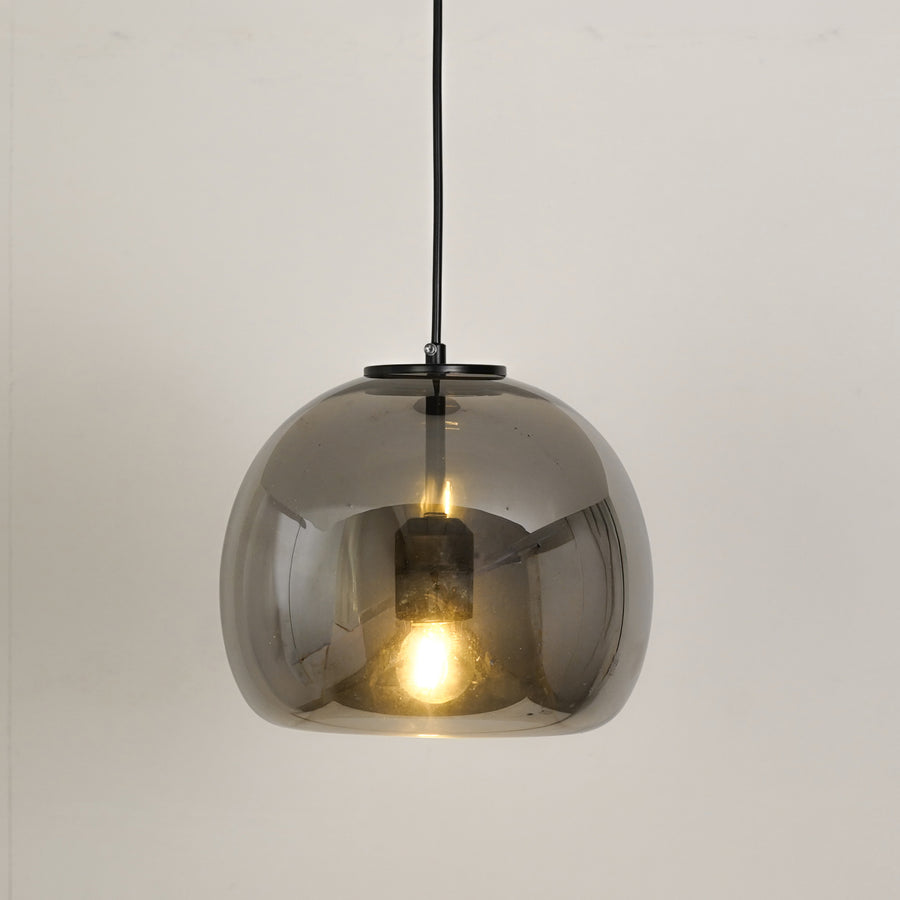 White background image of modern black metal pendant light for elegant dining room decor styling with bright illumination.