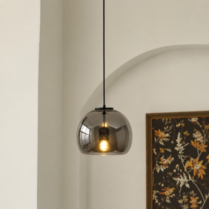 Lifestyle image of modern black metal hanging pendant light for elegant dining room decor styling with beautiful finish.