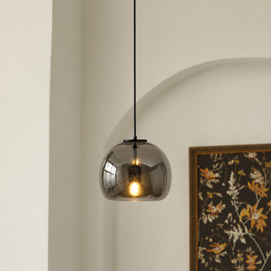 Lifestyle image of modern black metal hanging pendant light for elegant dining room decor styling with beautiful finish.