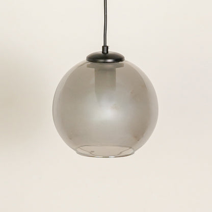 Frosted smoked glass pendant light with black fittings for refined contemporary spaces.