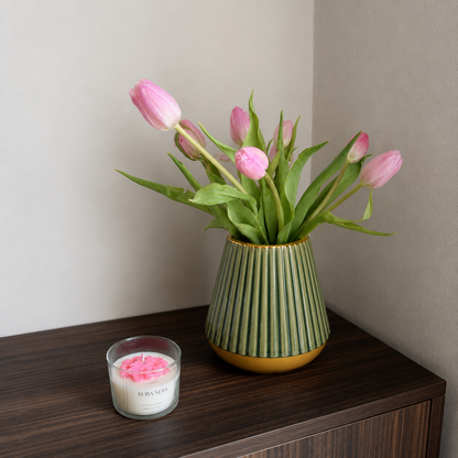 Lifestyle image of minimalist green gold ceramic vase for elegant room decor styling with modern smooth painted finish.