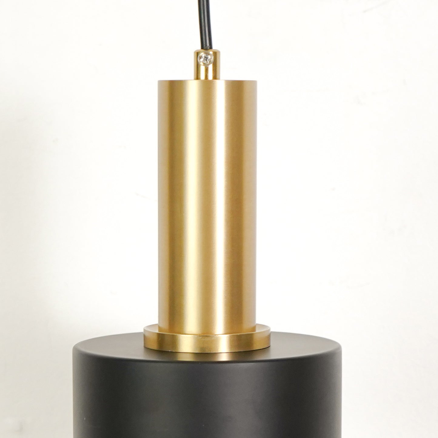 Closeup image of modern nordic golden wall lamp for elegant bedroom decor styling highlighting sleek metallic gold finish.