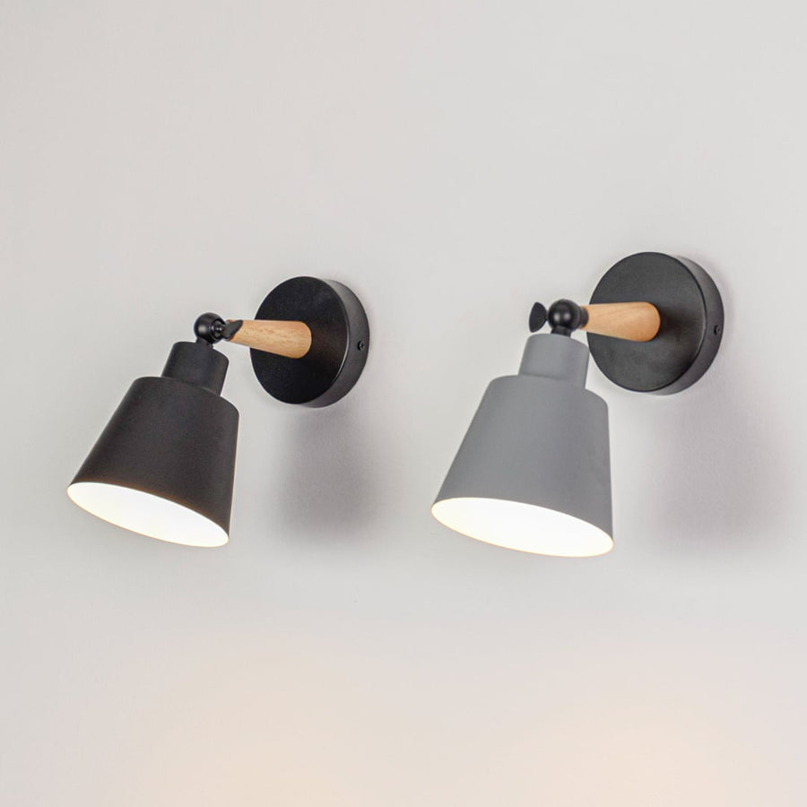 Pair of wall lights displayed together showing color variation and consistent design ideal for coordinated lighting across modern interior spaces.