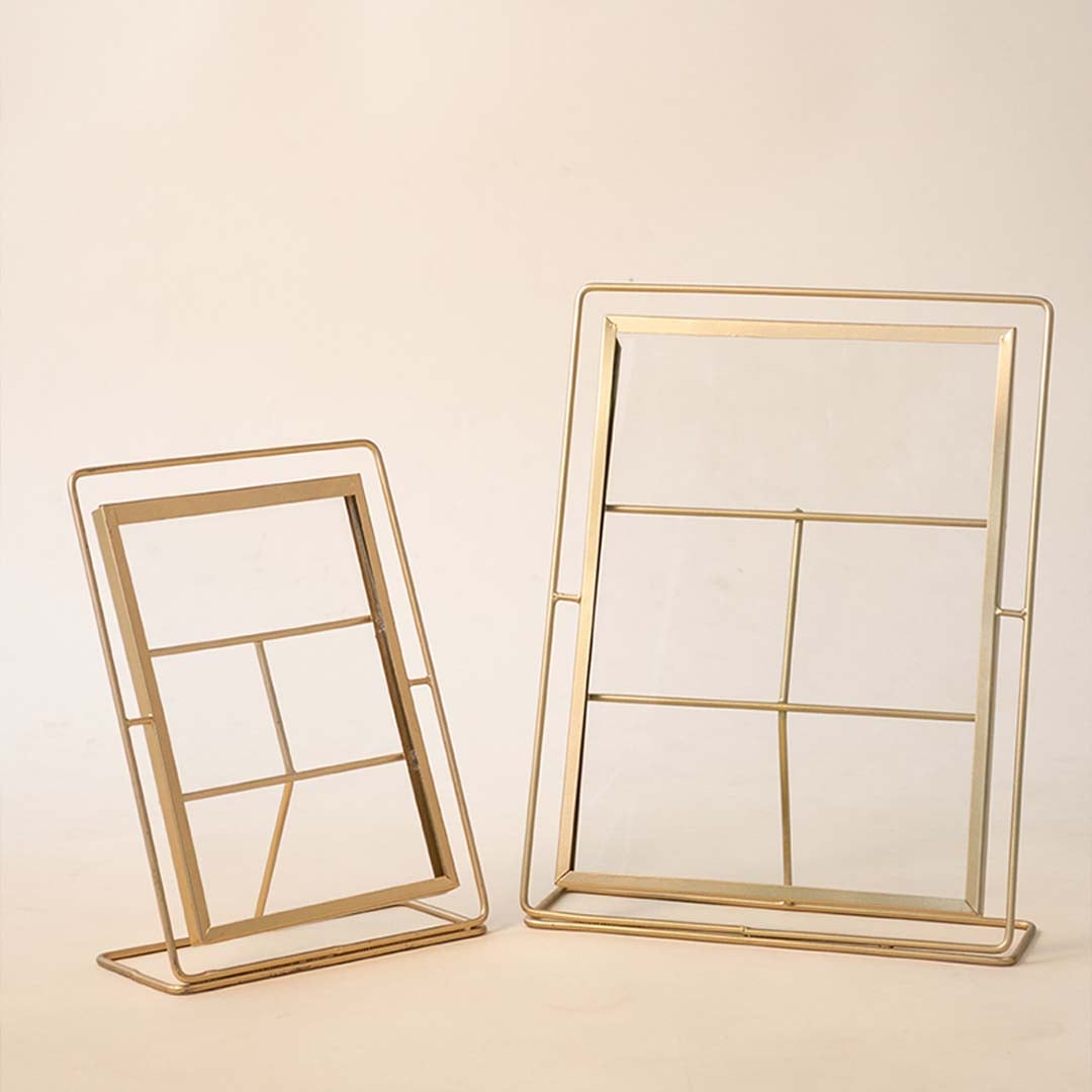 Set of gold metal photo frames with minimalist design for contemporary tabletop styling and modern home decor.