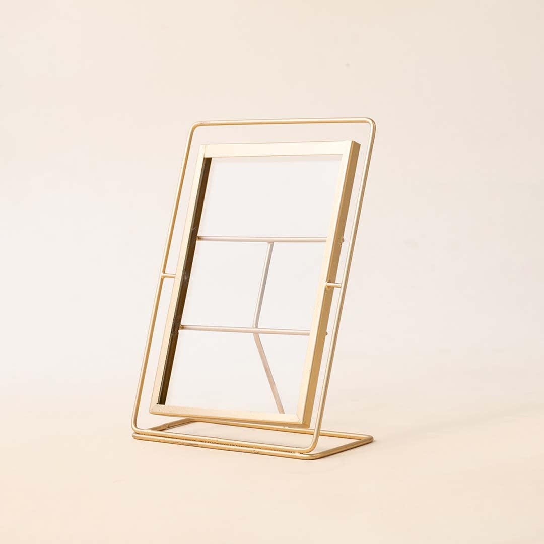 Gold metal photo frame with minimalist geometric design for tabletop styling and modern home decor displays.