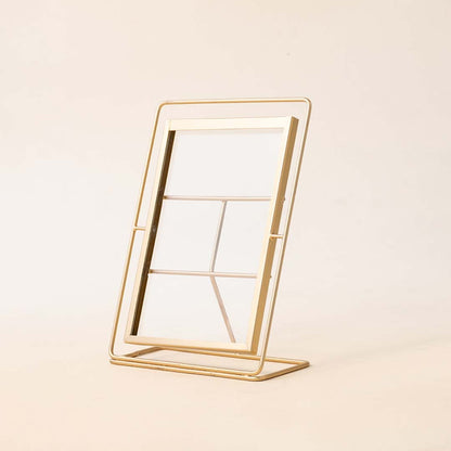 Gold metal photo frame with minimalist geometric design for tabletop styling and modern home decor displays.