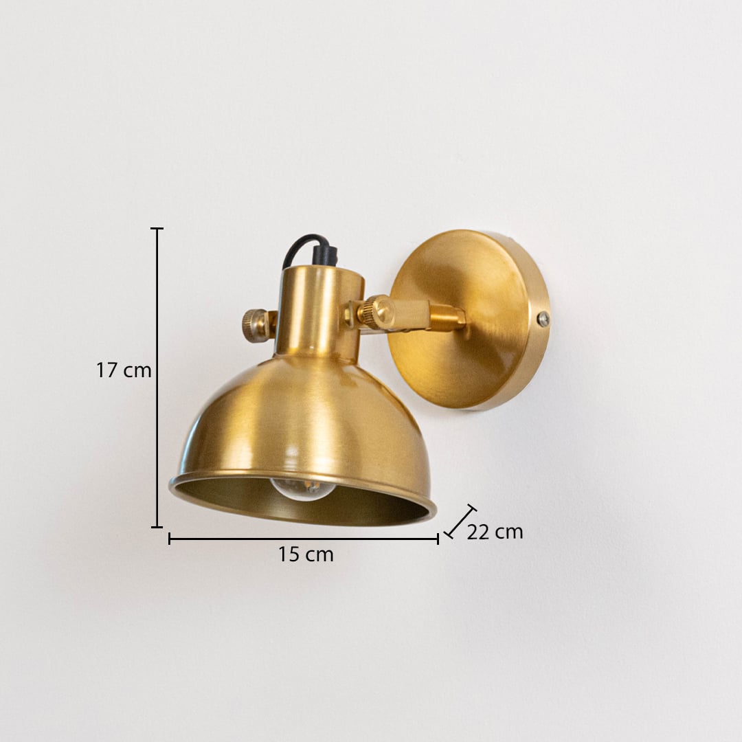 Gold metal wall light measuring 17 cm height 15 cm shade width and 22 cm projection suitable for indoor wall mounting.