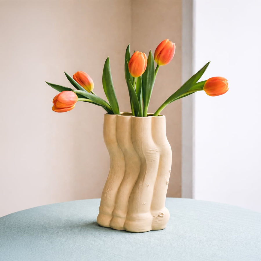 Beige ceramic textured floor vase with sculpted organic design perfect for dried flower display in living room corner and modern home decor.