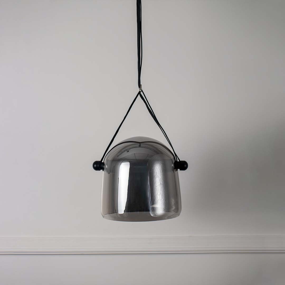 Silver metal pendant light displayed on white background highlighting clean industrial design for modern ceiling decor styling.