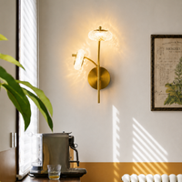 Lifestyle image of monaco donut metal wall sconce for elegant hallway decor styling and modern home interior lighting.