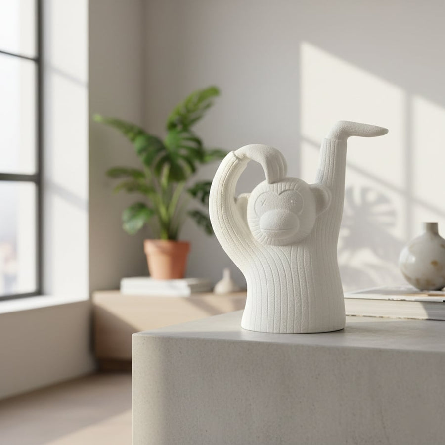 Textured white monkey sculpture decor styled in modern interior playful artistic figurine ideal for shelf console or side table styling.