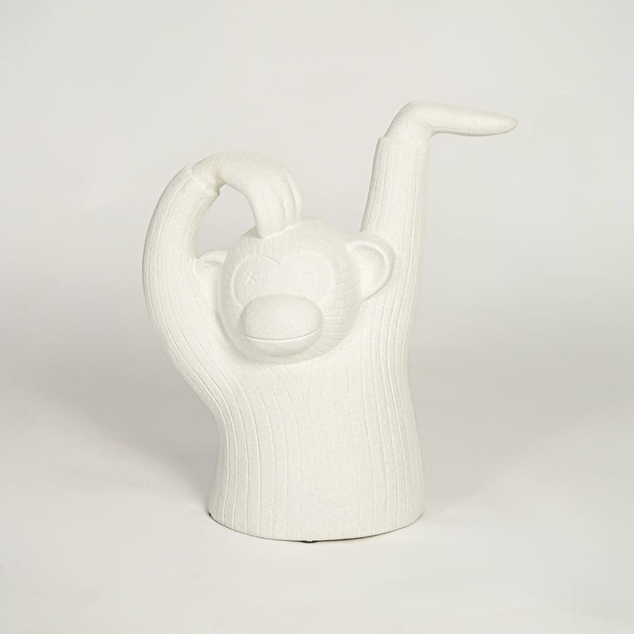 Modern white monkey figurine decor on white background textured sculptural accent for shelf console or office styling.