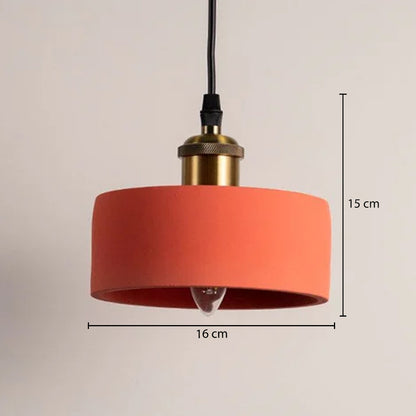 Dimension image of coral orange metal drum pendant light with brass accents showing 15 cm height and 18 cm width.