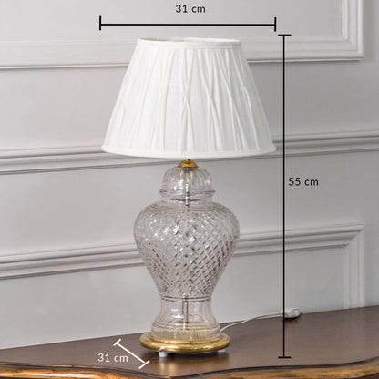 Clear etched glass table lamp with pleated fabric shade measuring 55 cm height and 31 cm width for elegant interiors.
