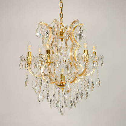 White background image of elegant clear crystal chandelier for elegant dining room decor styling with unlit crystal arms.