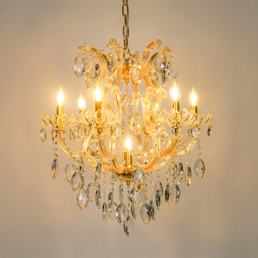 White background image of elegant clear crystal chandelier for modern living room decor styling with bright warm lighting.