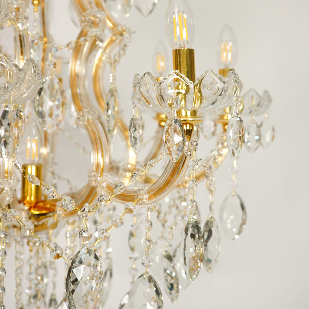 Closeup image of large clear crystal chandelier for modern dining room decor styling with beautiful clear crystal drops.