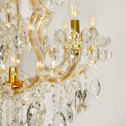 Closeup image of large clear crystal chandelier for modern dining room decor styling with beautiful clear crystal drops.