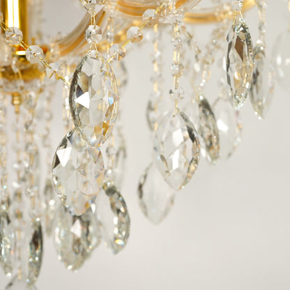 Closeup image of large clear crystal chandelier for luxury living room decor styling with beautiful clear crystal drops.