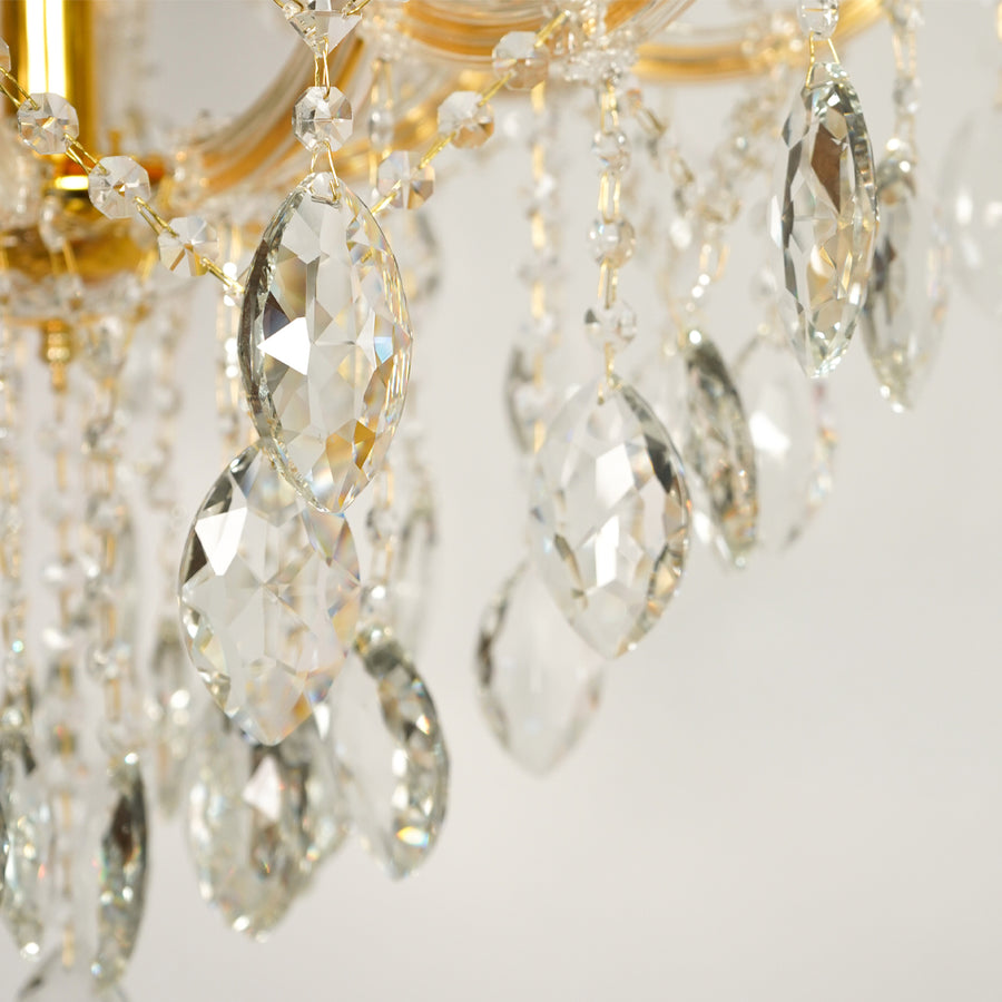 Closeup image of large clear crystal chandelier for luxury living room decor styling with beautiful clear crystal drops.