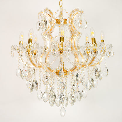 White background image of large clear crystal chandelier for elegant dining room decor styling with unlit clear crystals.