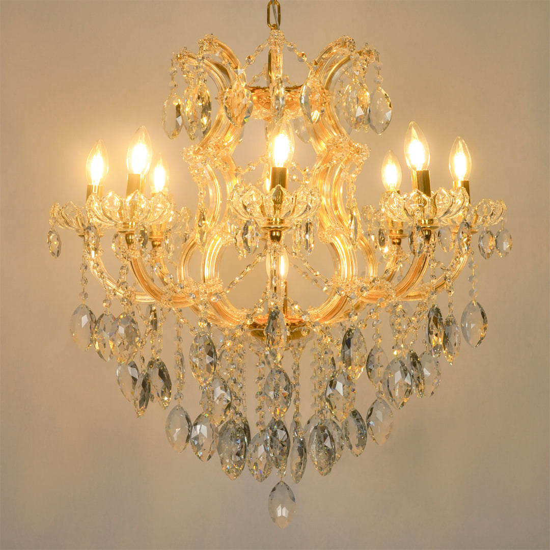 White background image of large clear crystal chandelier for modern living room decor styling with a bright warm lighting.