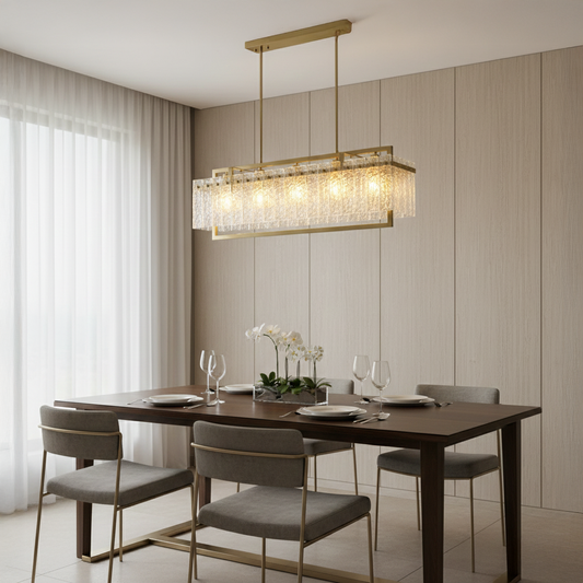 Gold metal crystal chandelier above dining table creating luxurious ambient lighting for modern dining room interiors.