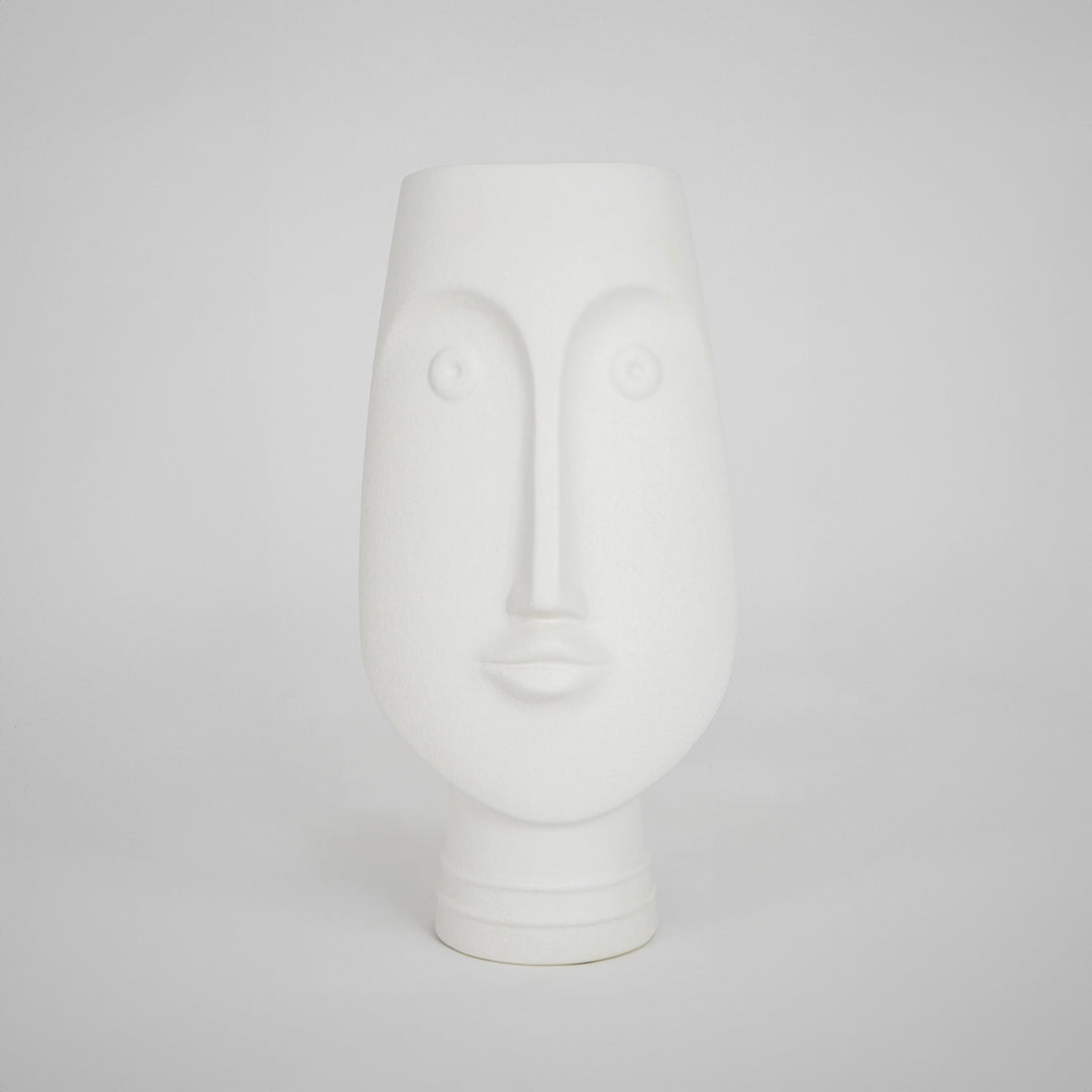 White face ceramic vase for elegant console table placement and contemporary indoor home decor styling piece.