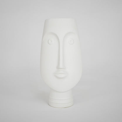 White face ceramic vase for elegant console table placement and contemporary indoor home decor styling piece.