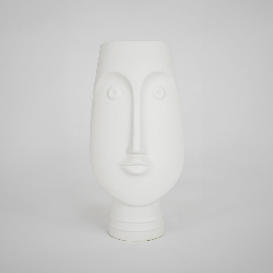 White face ceramic vase for elegant console table placement and contemporary indoor home decor styling piece.